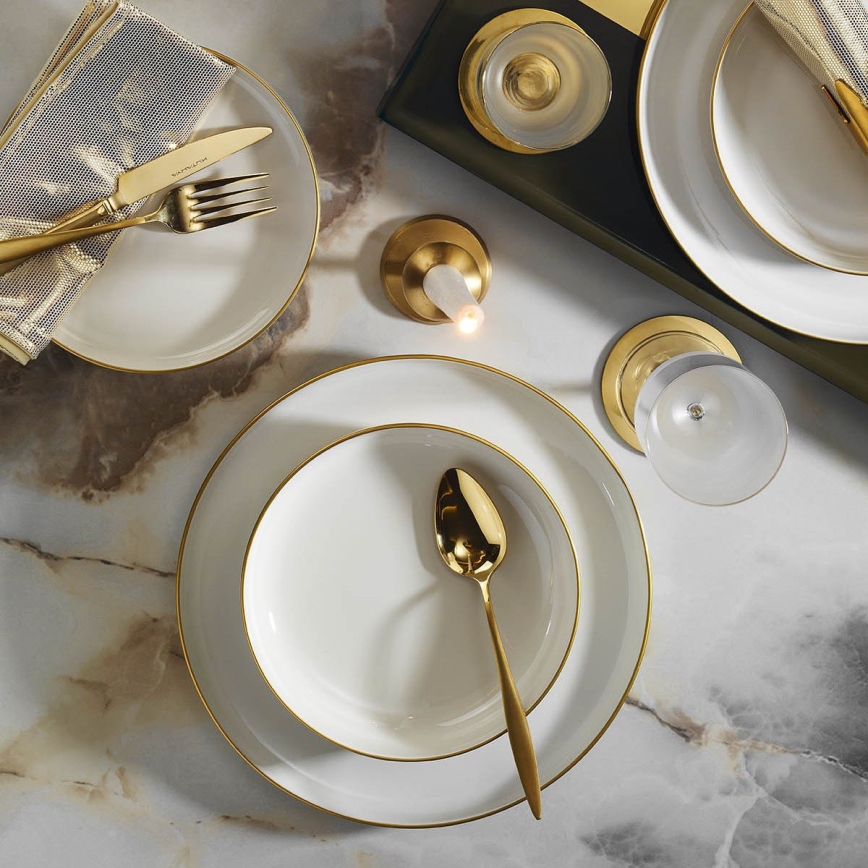 16-piece porcelain dinner set in white with gold trim