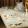18-piece dining set in clear glass and gold