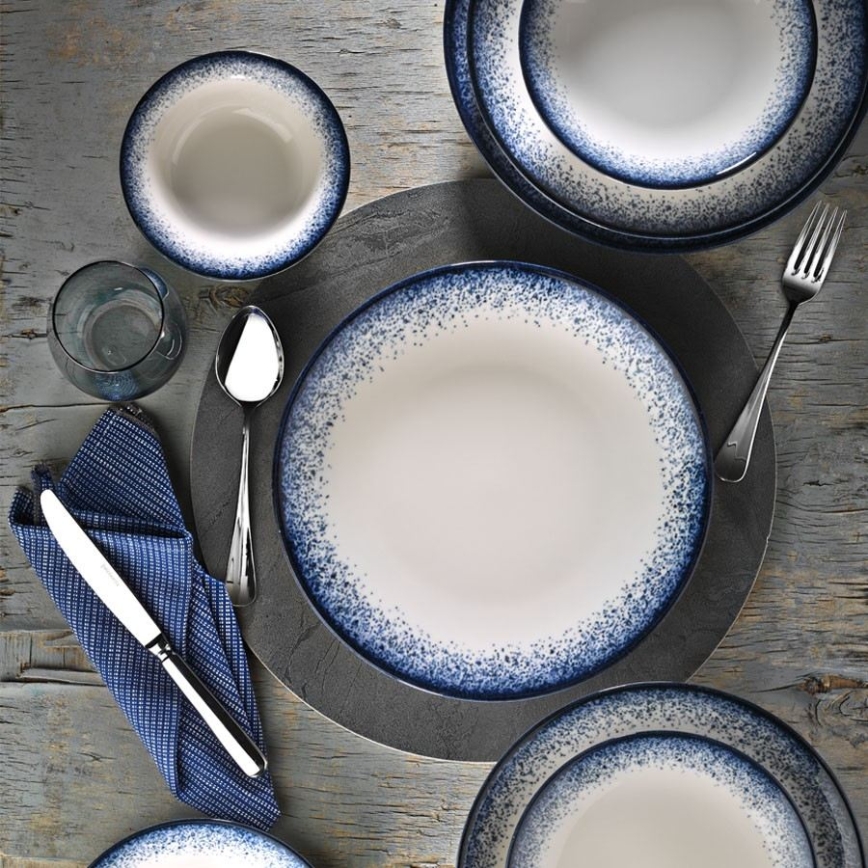 18-piece porcelain dinnerware set in white and blue