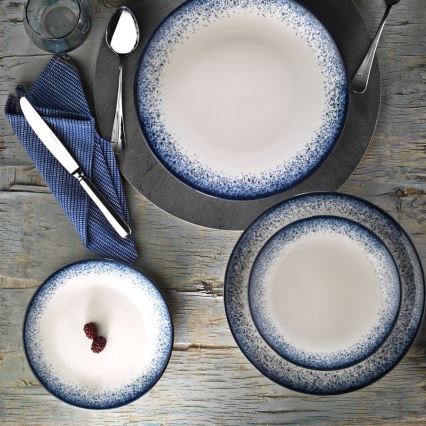 18-piece porcelain dinnerware set in white and blue