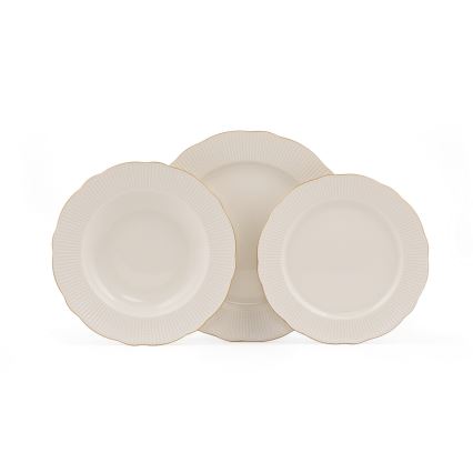 18-piece porcelain dinnerware set in white with gold accents