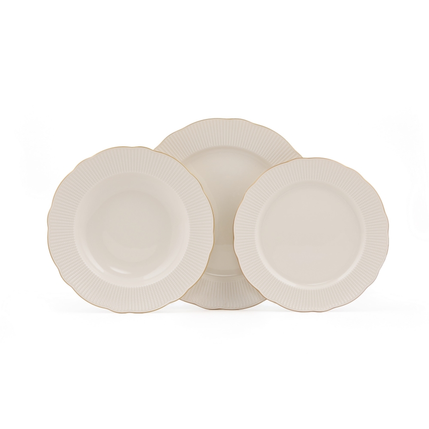 18-piece porcelain dinnerware set in white with gold accents