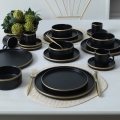 20-piece dining set in black and gold stoneware