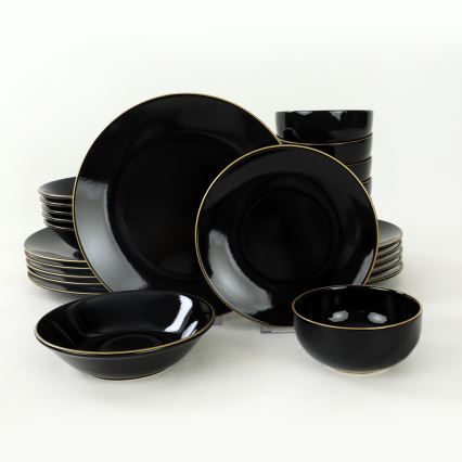 24-piece black stoneware dinner set with gold accents