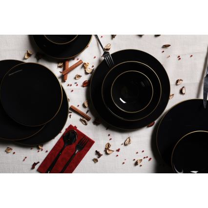 24-piece black stoneware dinner set with gold accents