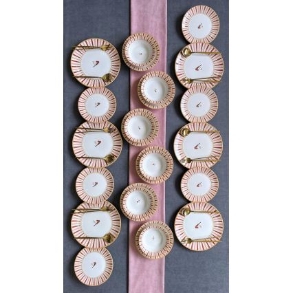 24-piece ceramic dinner set in white, red and gold