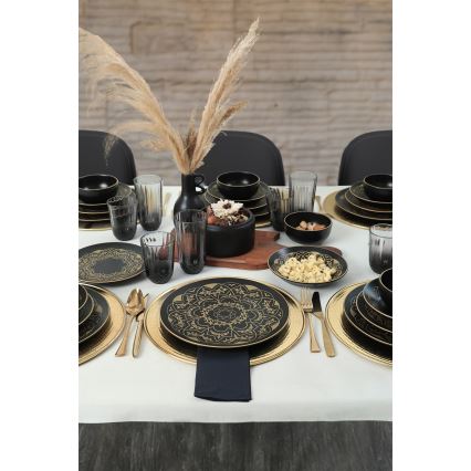 24-piece ceramic dinnerware set in black and gold