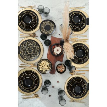 24-piece ceramic dinnerware set in black and gold