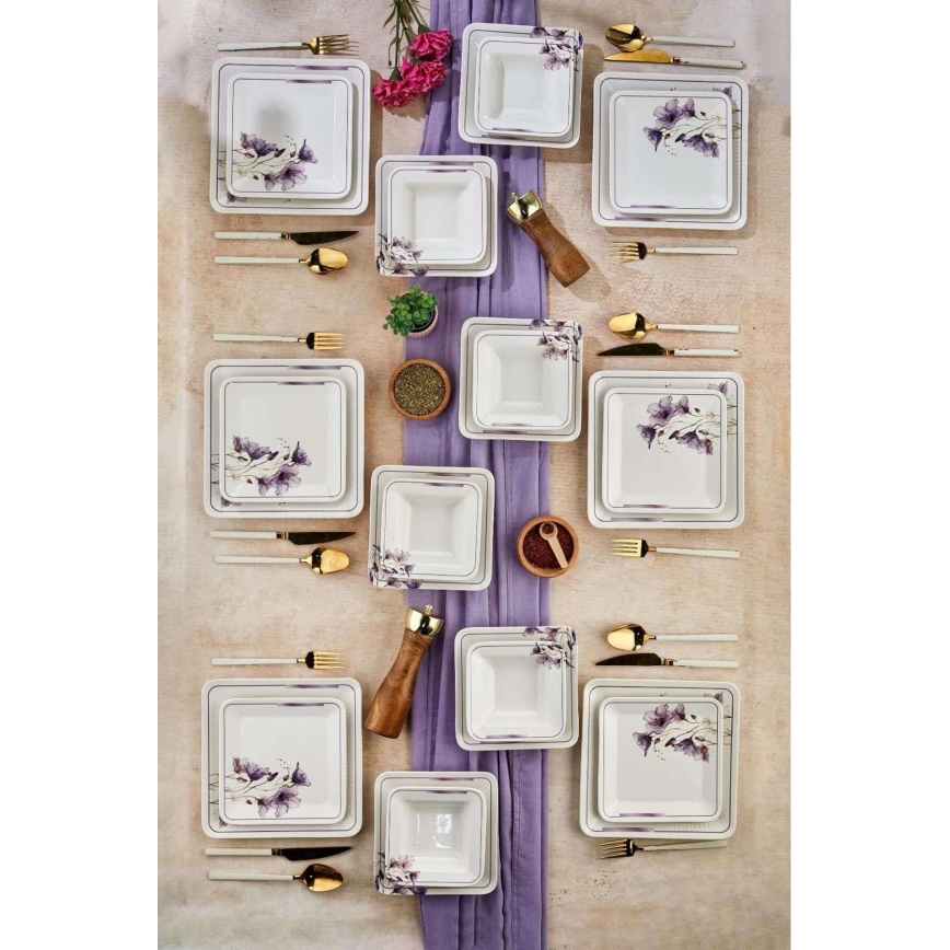 24-piece ceramic dinnerware set in white and purple