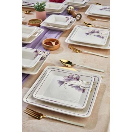 24-piece ceramic dinnerware set in white and purple