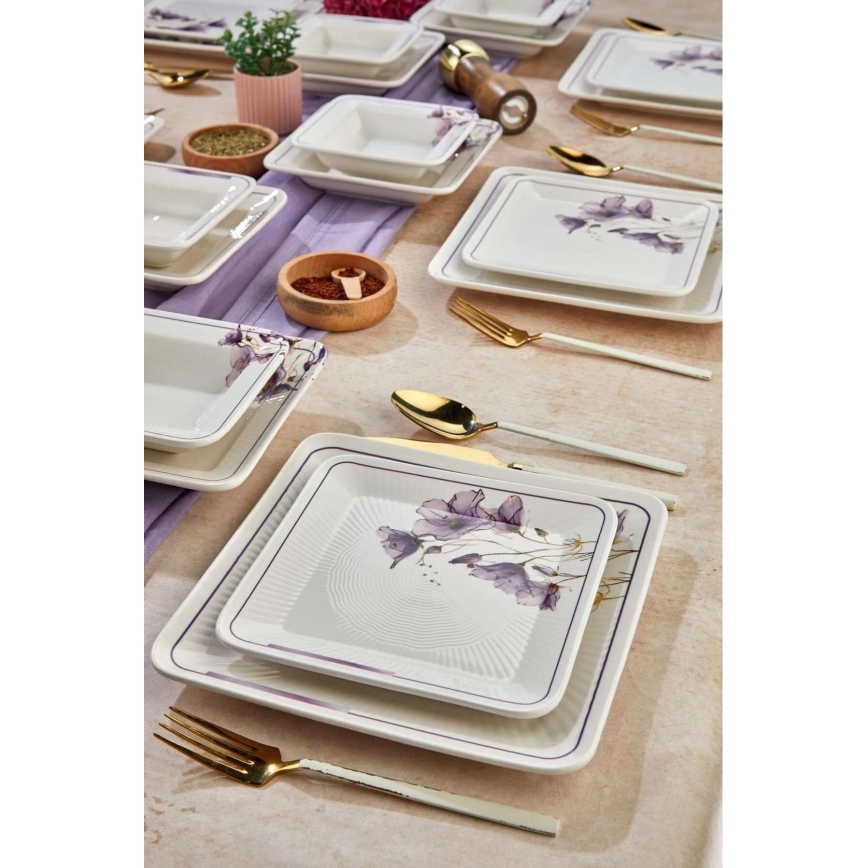 24-piece ceramic dinnerware set in white and purple