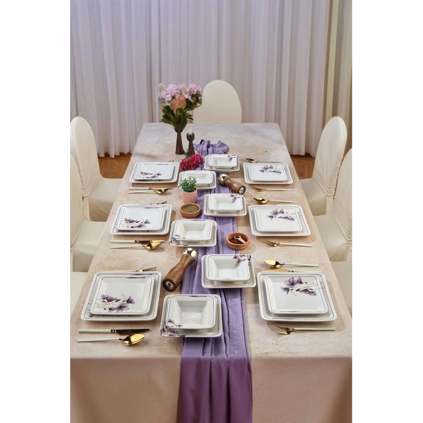 24-piece ceramic dinnerware set in white and purple