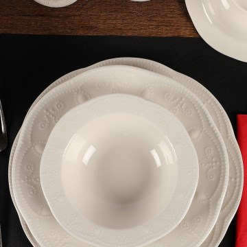 24-piece cream porcelain dinnerware set