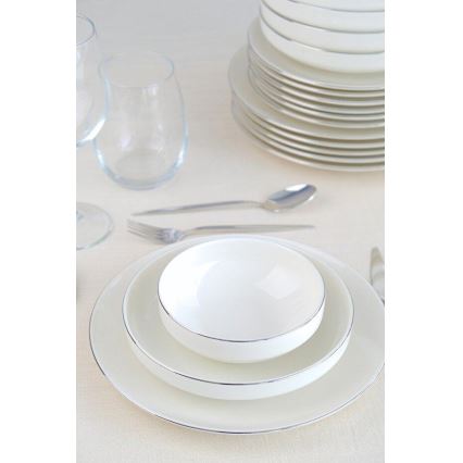 24-piece porcelain dining set in elegant white and silver