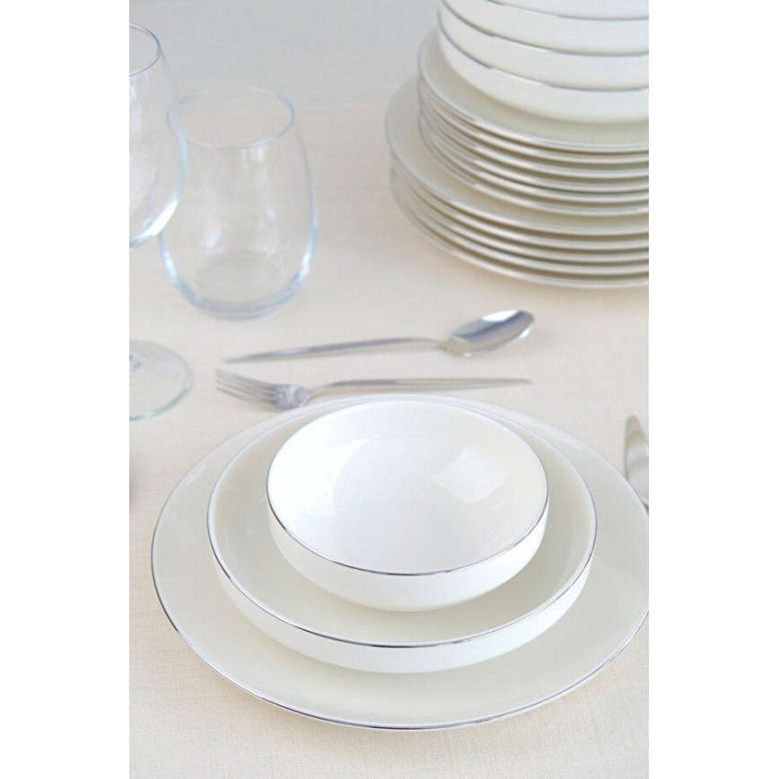 24-piece porcelain dining set in elegant white and silver