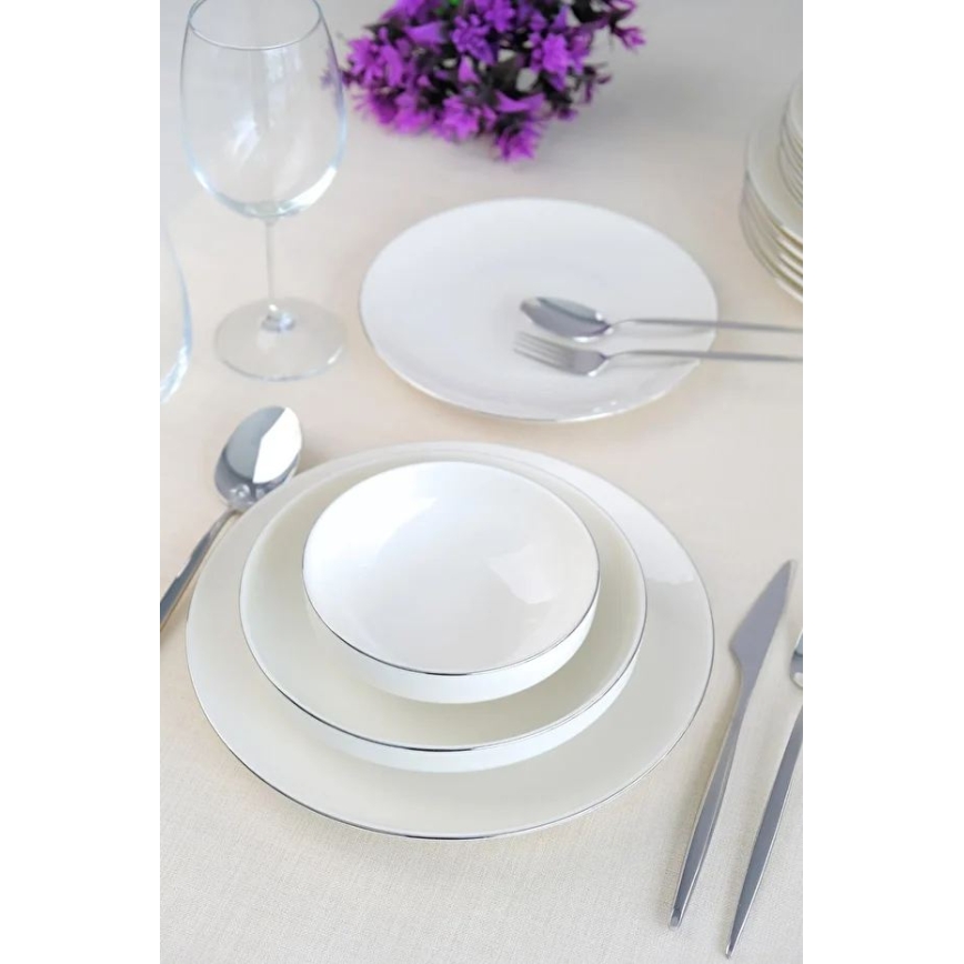 24-piece porcelain dining set in elegant white and silver