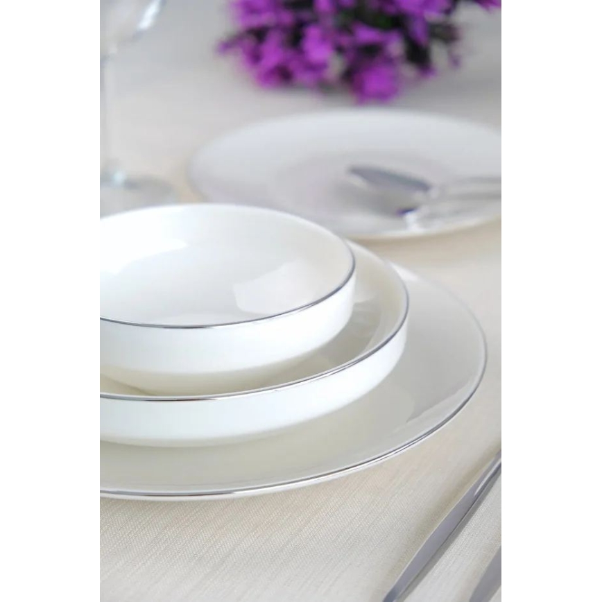 24-piece porcelain dining set in elegant white and silver