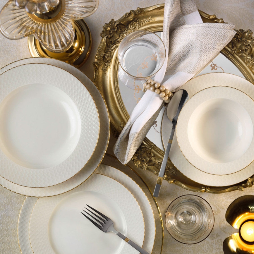 24-piece porcelain dining set in white with gold trim