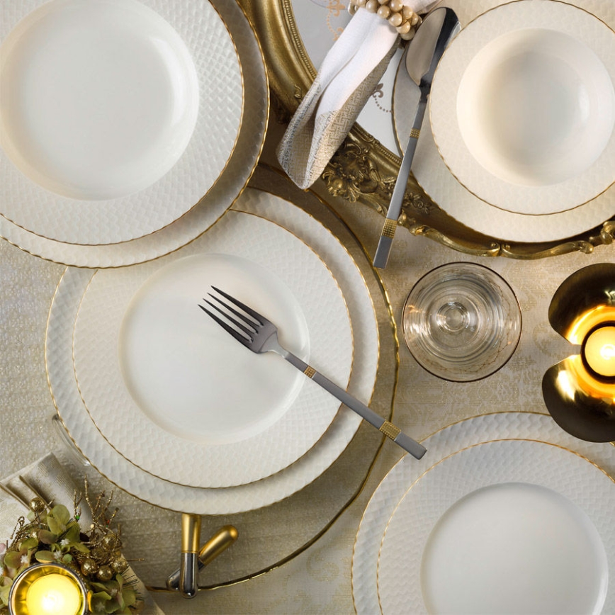 24-piece porcelain dining set in white with gold trim