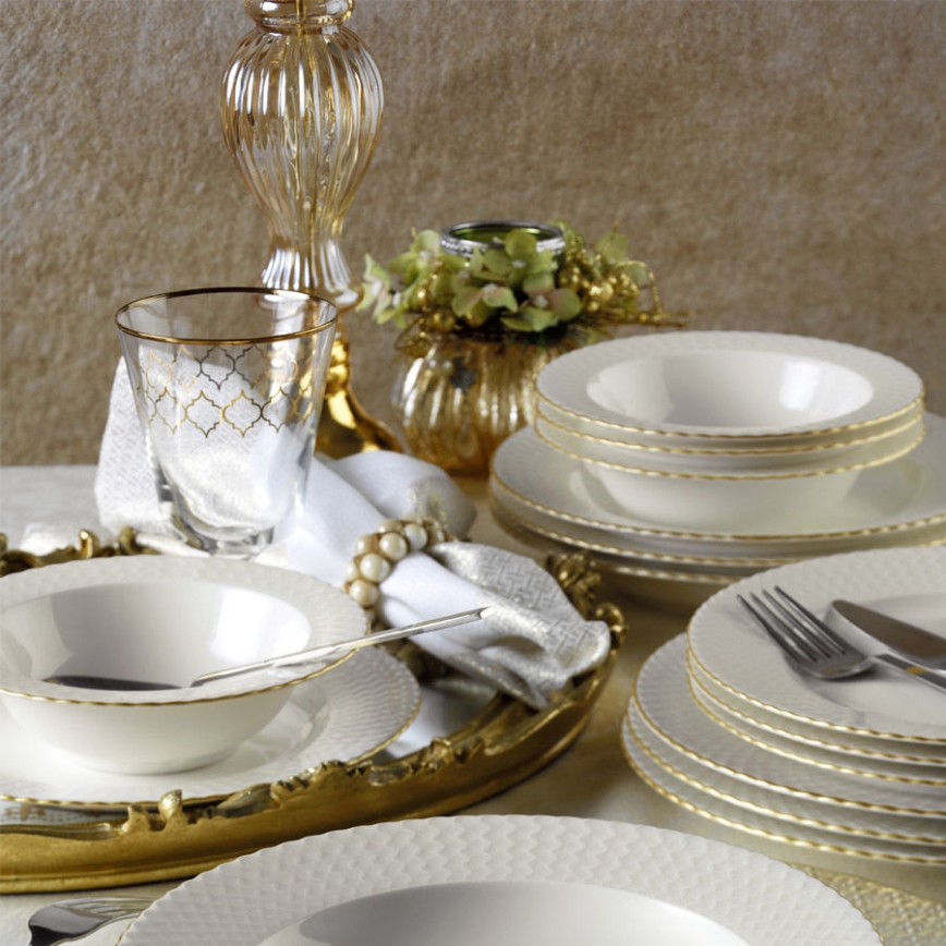 24-piece porcelain dining set in white with gold trim