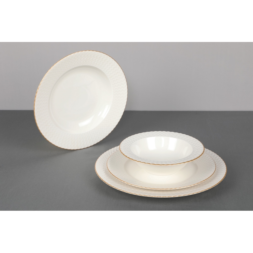 24-piece porcelain dining set in white with gold trim