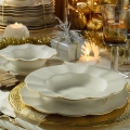 24-piece porcelain dinner set in white with gold accents