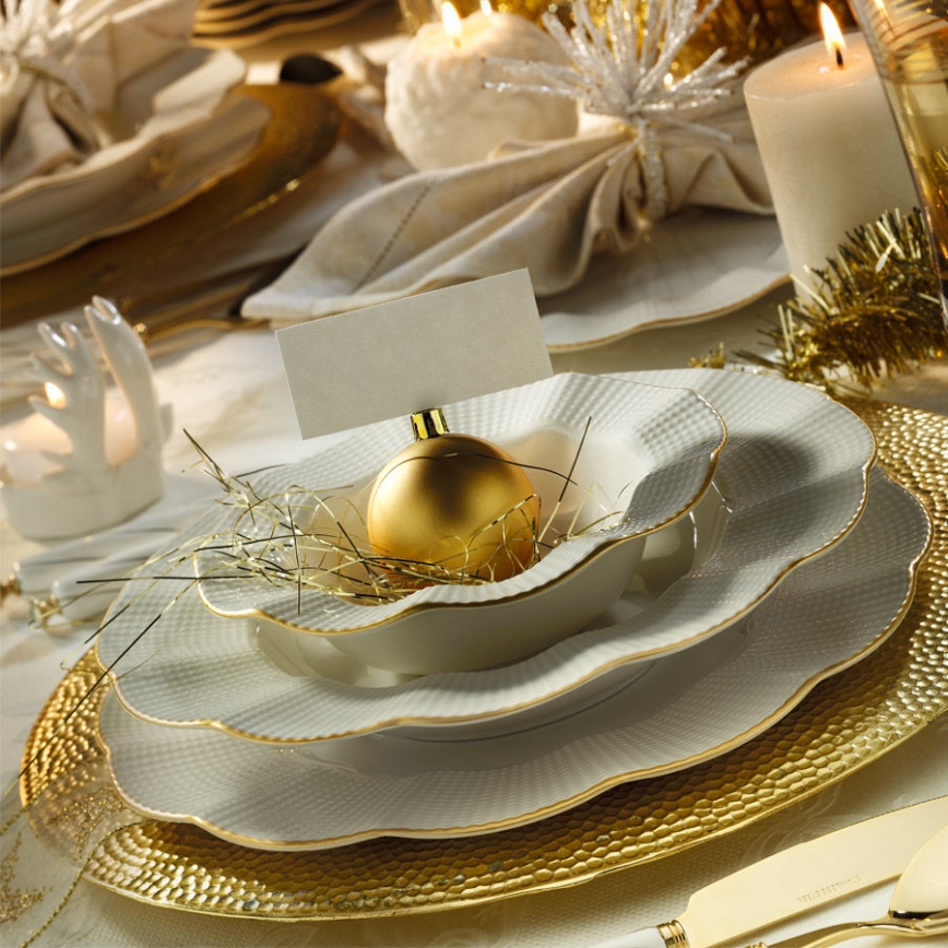 24-piece porcelain dinner set in white with gold accents