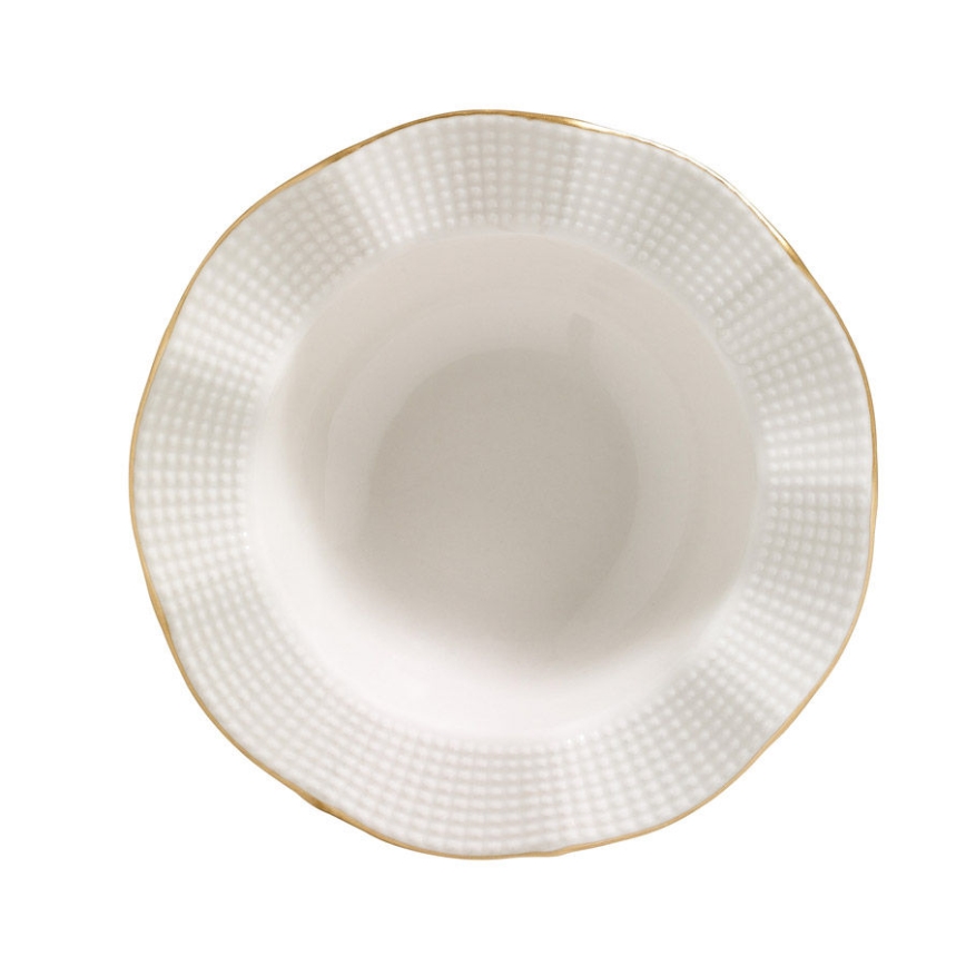 24-piece porcelain dinner set in white with gold accents