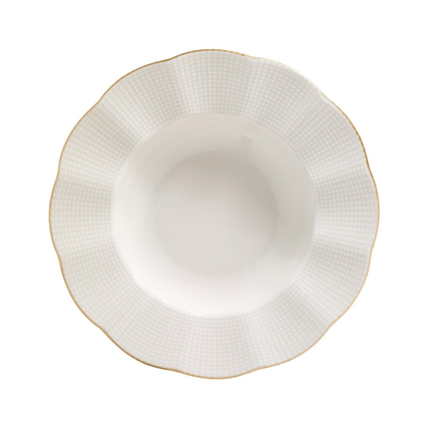 24-piece porcelain dinner set in white with gold accents