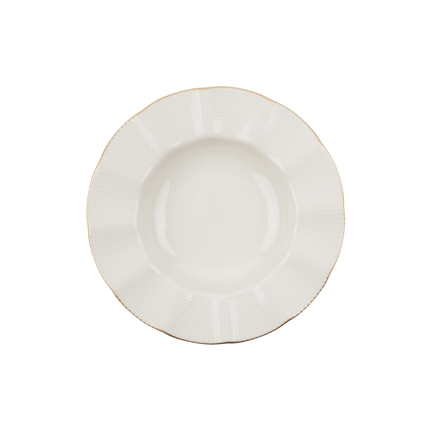 24-piece porcelain dinner set in white with gold accents