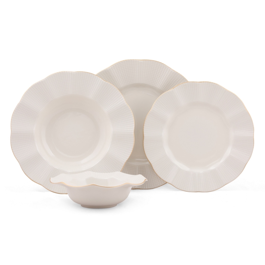 24-piece porcelain dinner set in white with gold accents
