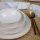 24-piece porcelain dinner set in white with gold trim