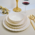 24-piece porcelain dinner set, white with gold trim