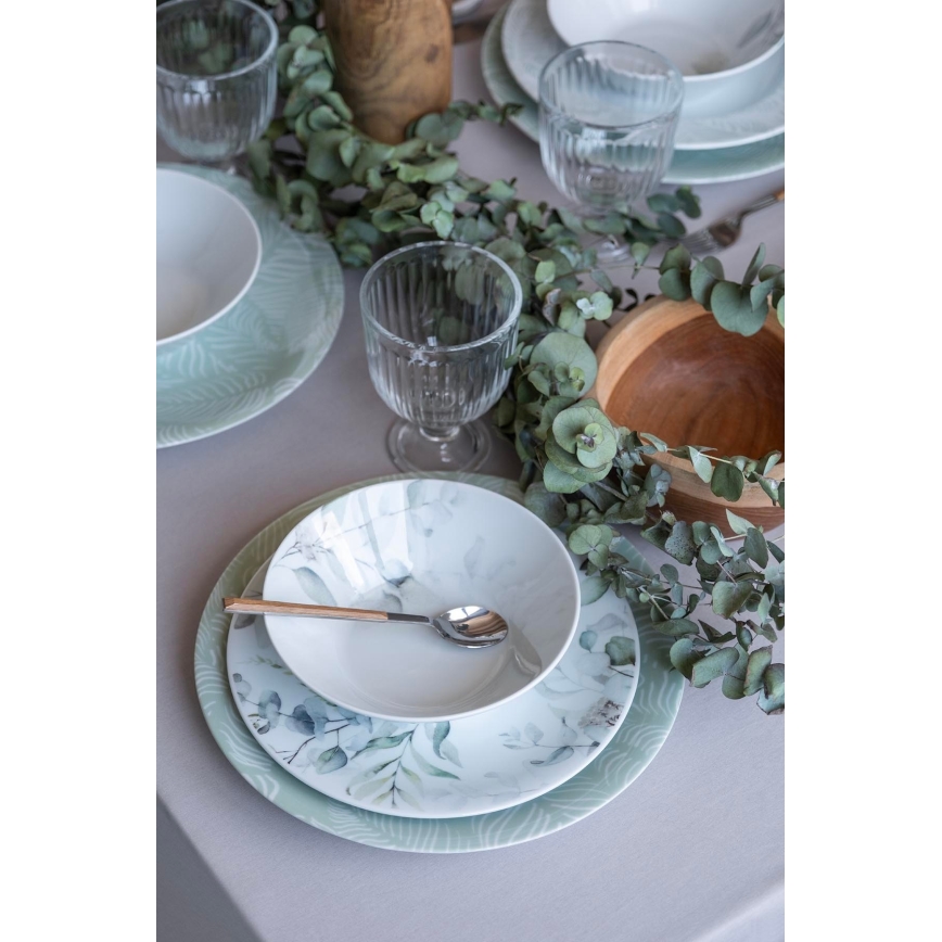 24-piece porcelain dinnerware set in white and green