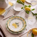 24-piece porcelain dinnerware set in yellow, white and green