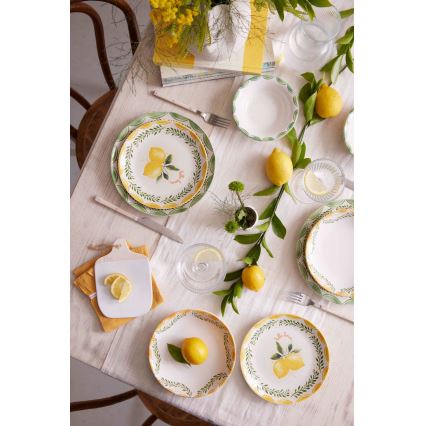 24-piece porcelain dinnerware set in yellow, white and green
