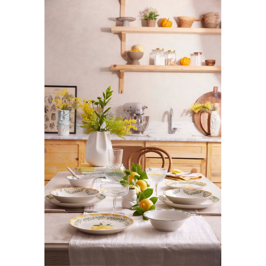 24-piece porcelain dinnerware set in yellow, white and green