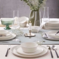 24-piece porcelain dinnerware set — white with silver trim
