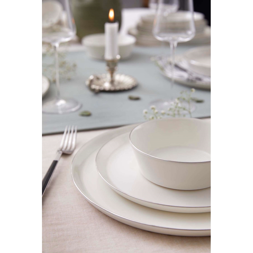 24-piece porcelain dinnerware set — white with silver trim