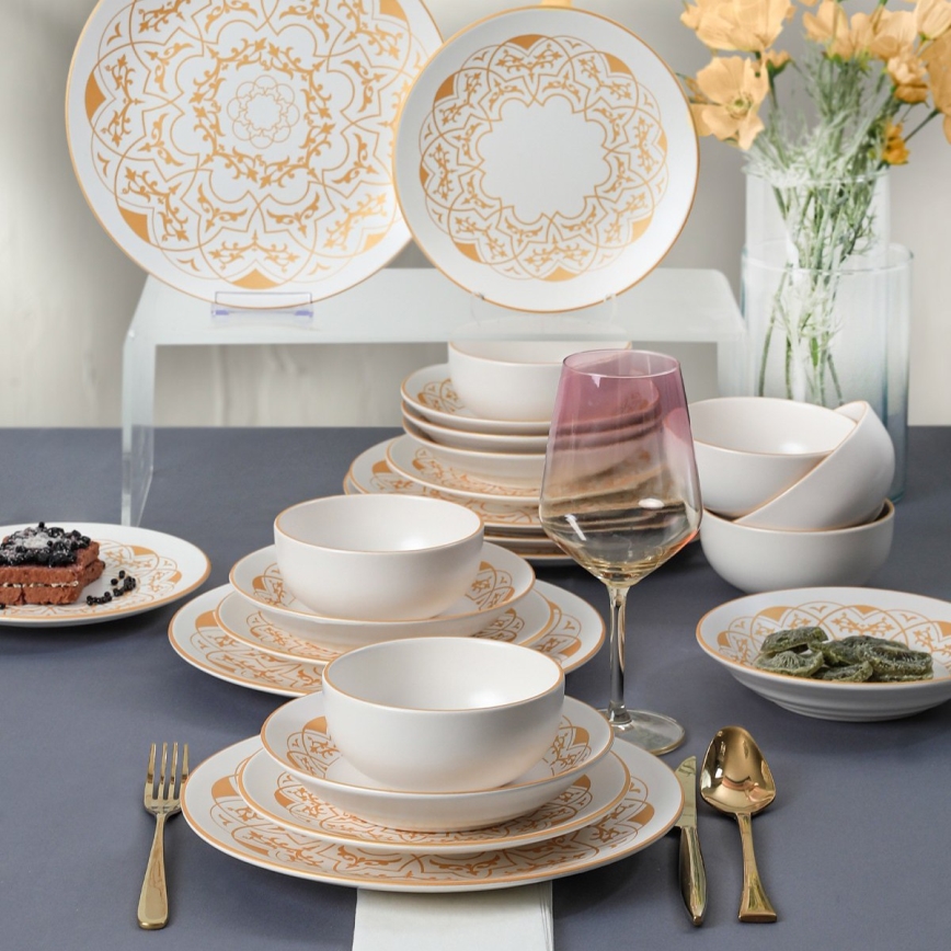 24-piece white and gold ceramic dinnerware set