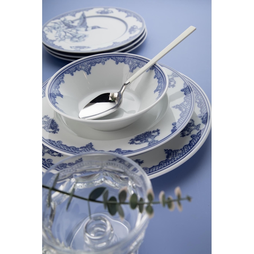26-piece porcelain dinnerware set in white and blue