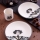 4-piece porcelain dinner set in black and white