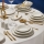53-piece porcelain dinnerware set – white with gold trim