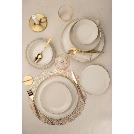 8-piece porcelain dinnerware set in white with gold accents