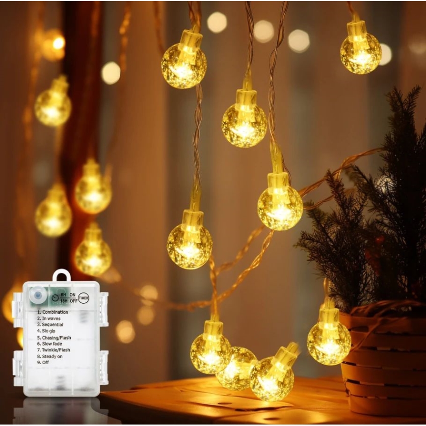 Aigostar - LED Outdoor String Lights 100 LEDs / 3×AA / 8 Modes 10.3 m IP44 Warm White