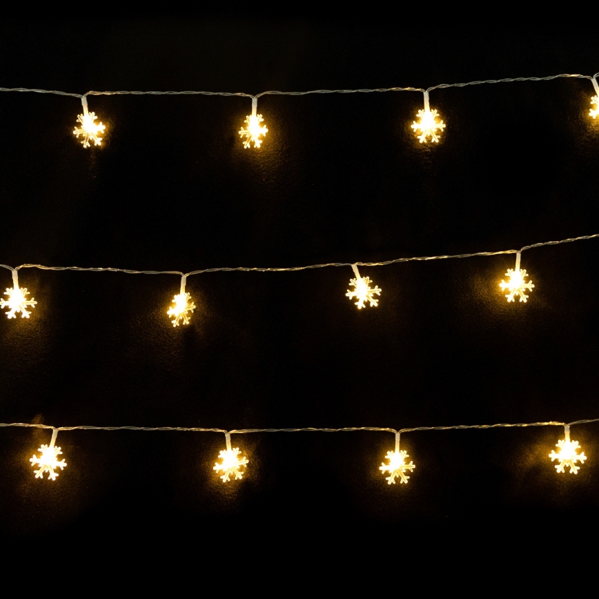 Aigostar - LED string lights 10xLED/3xAA 1,5m warm white snowflakes