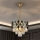 Brilagi - CRISTAL chain-hung chandelier, 5xE14/40W/230V, Ø 38 cm, gold/black
