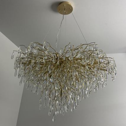 Crystal chandelier on a string 11xG9/40W/230V gold