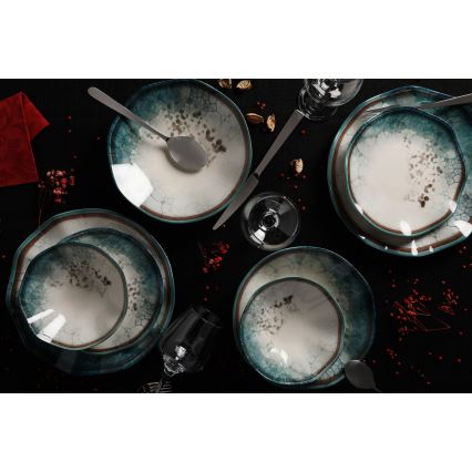 Elegant 24-piece dinnerware set in blue porcelain
