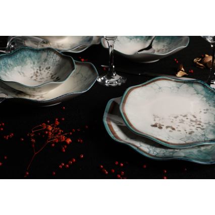 Elegant 24-piece dinnerware set in blue porcelain